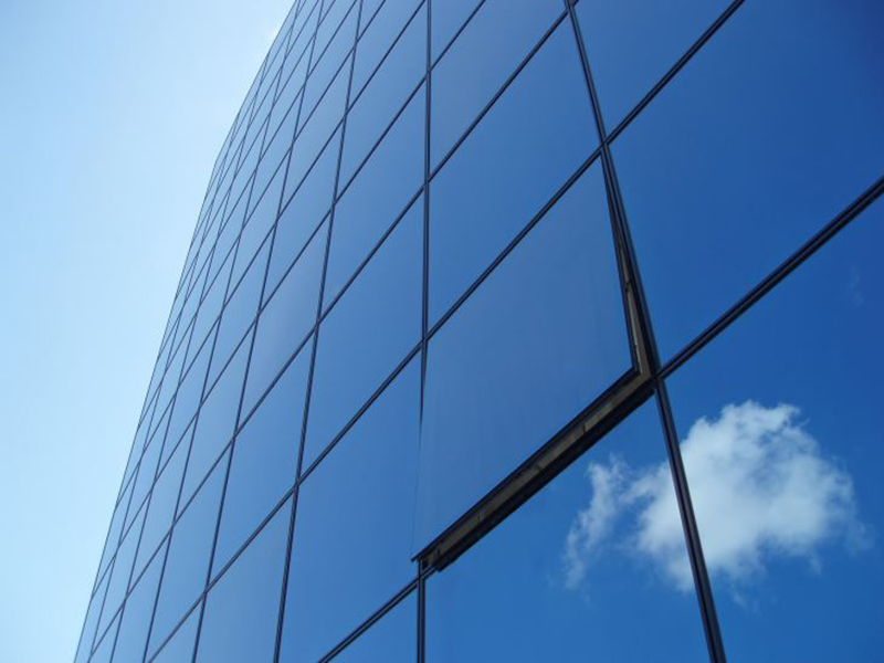 What is hidden frame glass curtain wall?